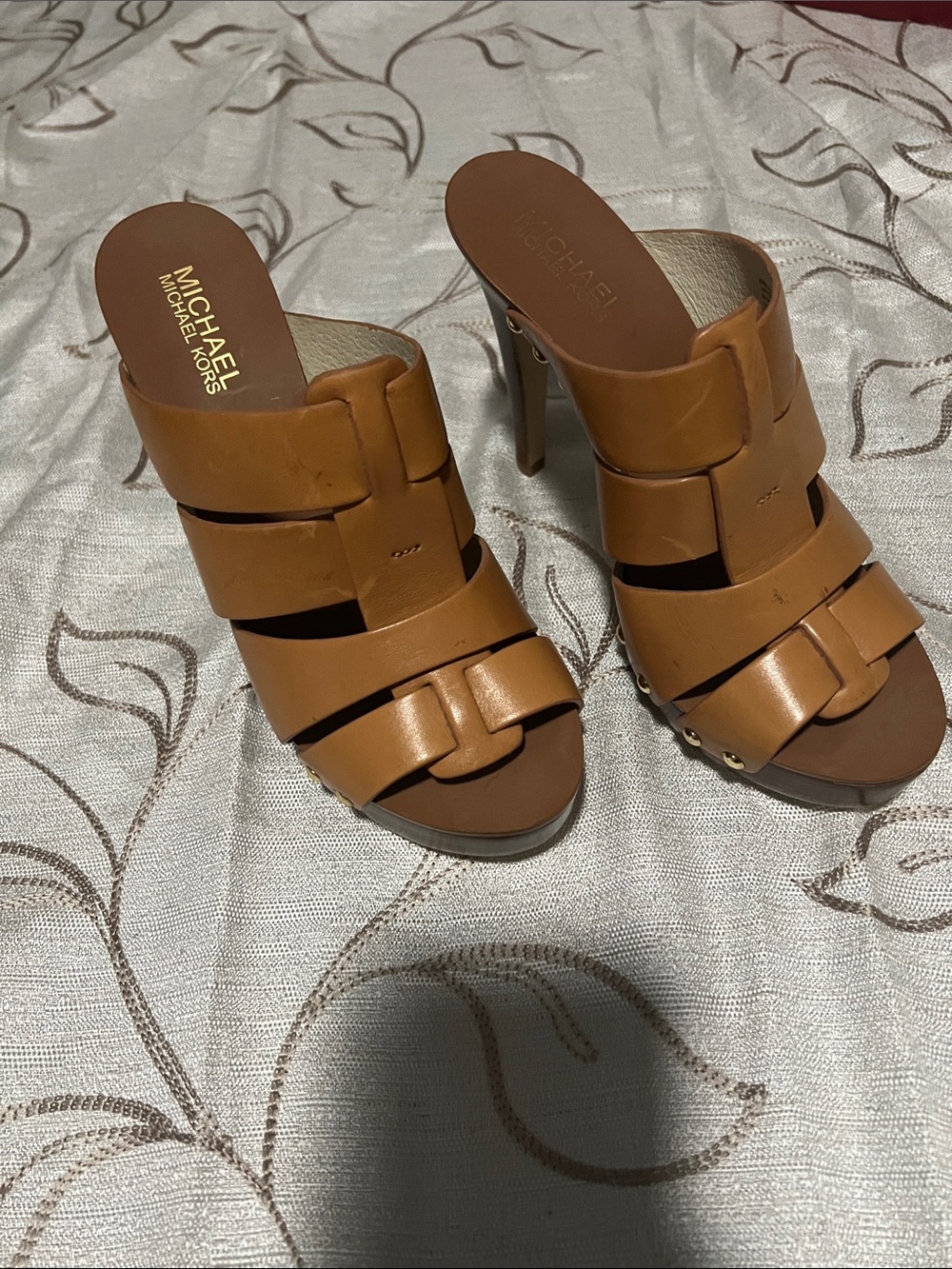 Michael Kors Somerly Mule Pumps in a peanut/tan shade